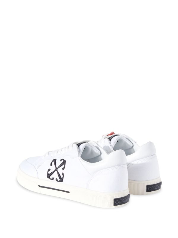 VULCANIZED CONTRASTING-TAG CANVAS SNEAKERS